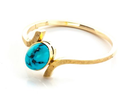A TURQUOISE BANGLE, IMMO BÖHLKE hinged, S-shaped centred by an oval cabochon turquoise, in 14ct goldapproximate inner circumf