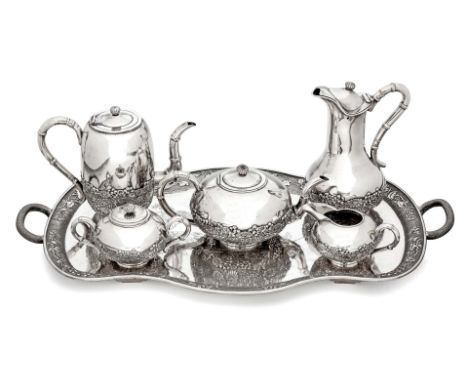 A CHINESE SIX PIECE SILVER TEA SERVICE, LUEN HING, SHANGHAI, CIRCA 1900 comprising: a teapot, milk jug, sugar bowl, hot water