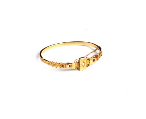 A DIAMOND AND RUBY BRACELET centred by an old-cut pavé-set diamond in a star design, within a rectangular gold box flanked by