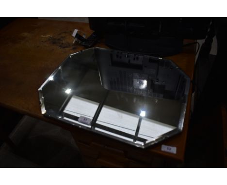 A vintage frameless canted wall mirror, width approx. 46cm