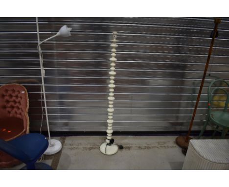 A modern pearl white standard lamp, powder coated metal
