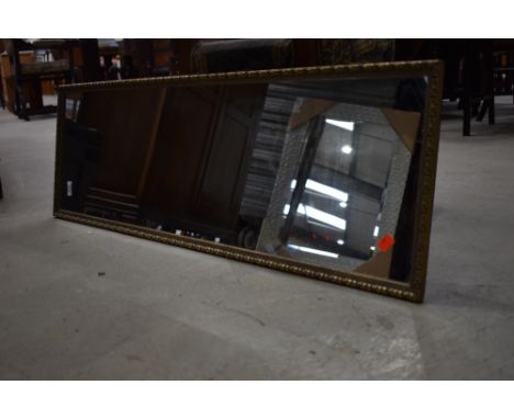A gilt frame full length wall mirror , approx 105 x 34cm