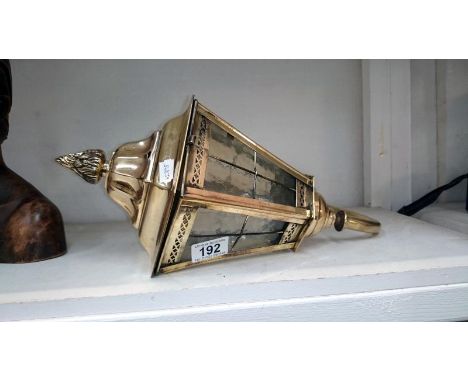 An Edwardian exterior brass wall lantern
