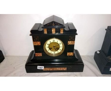 An Edwardian black slate mantel clock