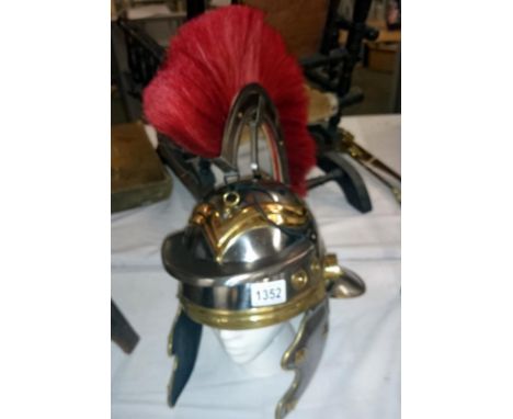 A reproduction Roman centurion helmet