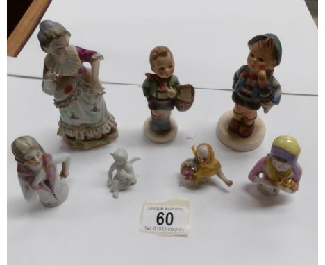 2 Goebel figures, another figure, 3 pin dolls and a cherub