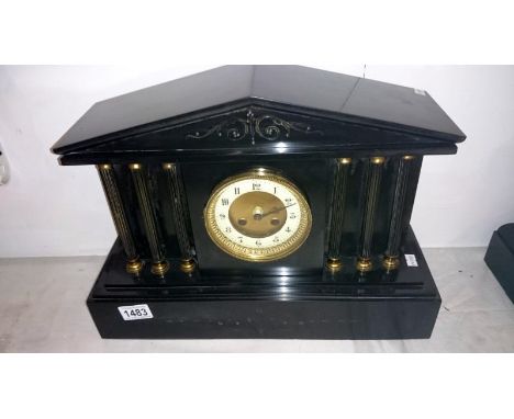 A black slate Paladian style mantel clock converted to battery movement