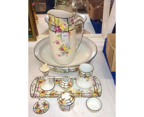 An Edwardian jug and basin set