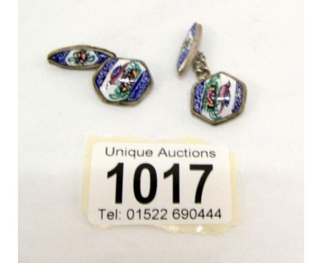 A pair of Persian silver and enamel hand painted cuff links