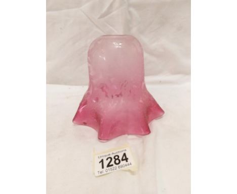 A Victorian cranberry etched glass lamp shade