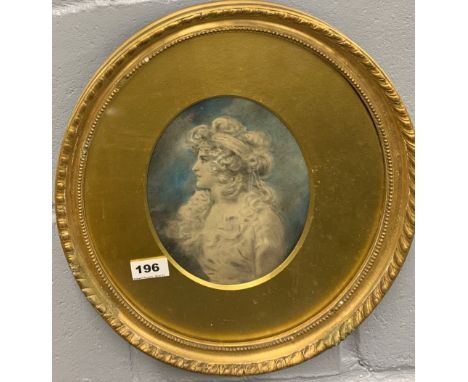 An oval gilt framed watercolour portrait of a young woman, frame size 35 x 40cm.