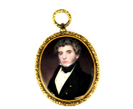 A gilt framed hand painted portrait miniature of a young gentleman with a lock of hair and the initial D in the back, L. 8.5c