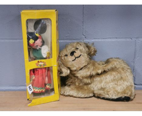 A box Pelham puppet and a 1940's plush dog tea cosy.