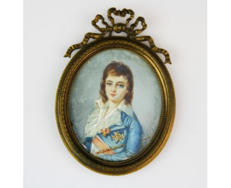 A 19th century hand painted portrait miniature noted verso as the Comte Naumdorf, L. 10cm.