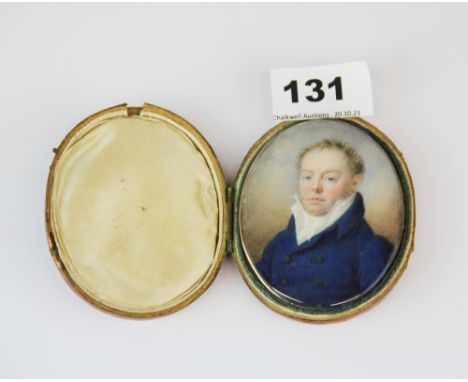 A yellow metal framed hand painted 18th century portrait miniature of a gentleman in a leather carrying case, L. 9cm.