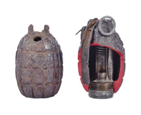 Two WWII Second World War British Army Mills Bomb hand grenades. One a demonstration / educational example with visible cross