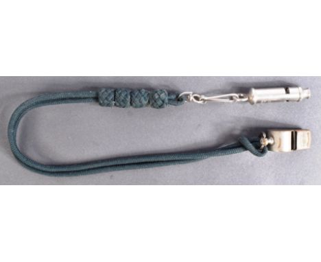 A WWI First World War era military issue trench whistle by J. Hudson &amp; Co of Birmingham. Broad arrow marked, with number 