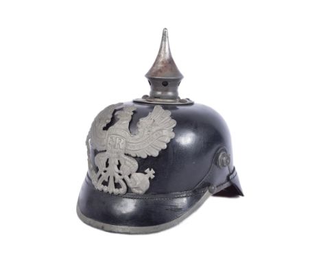 A WWI First World War Imperial German Army / Prussian M15 pickelhaube uniform helmet. Leather construction with nickel / meta