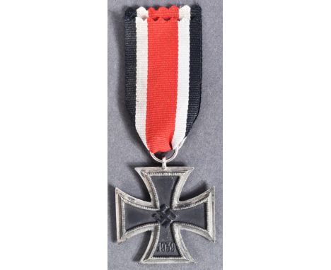 A WWII Second World War Third Reich Nazi German Iron Cross medal. A Second Class example of two part construction with iron c