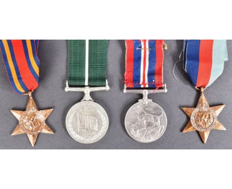 A WWII Second World War medal trio comprising British War medal, The Burma Star, 1939-1945 Star and a Pakistan Medal awarded 