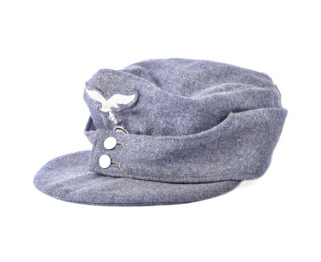 A WWII Second World War Third Reich Nazi German Luftwaffe Officers M43 ski cap. Field grey / blue wool with a front Luftwaffe