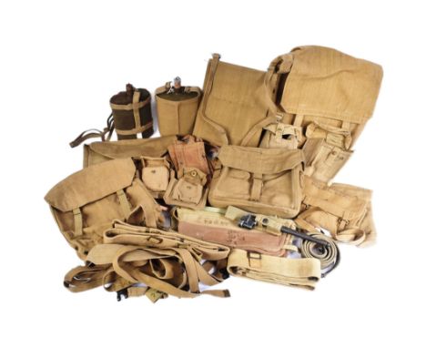A collection WWII Second World War British Army uniform webbing equipment to include; x1 large pack, x1 small pack, water bot