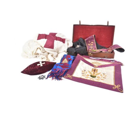 An original Masonic Knights Templar uniform regalia comprising mantle and tunic, maroon velvet cap, black sash with silver do
