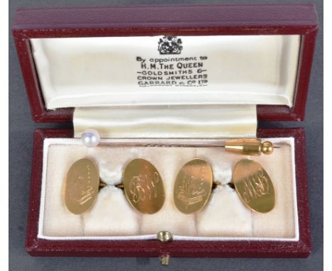A 9ct gold hallmarked set of cufflinks, engraved to one side with the SAS 'Who Dares Wins' motto and badge, the other side en