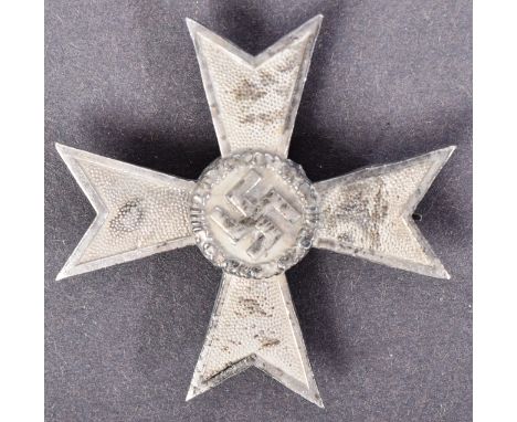 A WWII Second World War Third Reich Nazi German non-combatant war merit cross. A First Class example depicting the Maltese Cr