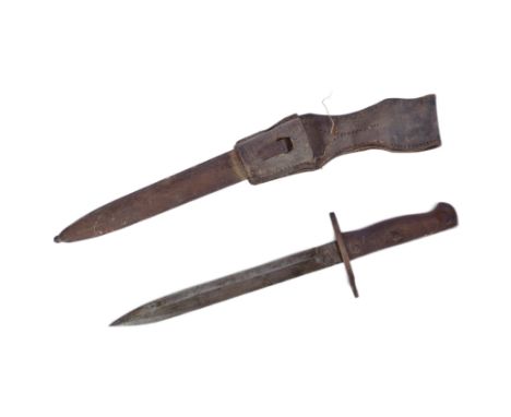 A WWI First World War German Ersatz (substitute) rifle bayonet. Pressed still grip, crossguard with muzzle ring and a single 