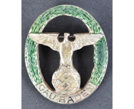 A WWII Second World War Third Reich Nazi German Gau Baden party badge. German eagle and Swastika emblem within a wreath, at t