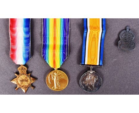 A WWI First World War medal trio awarded to one 010987 Private E.W Black of the Army Ordnance Corps comprising his Victory Me