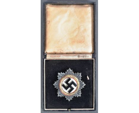 A WWII Second World War Third Reich Nazi German ' Deutsches Kruez ' ( The German Cross ) medal. The German Cross being a gold