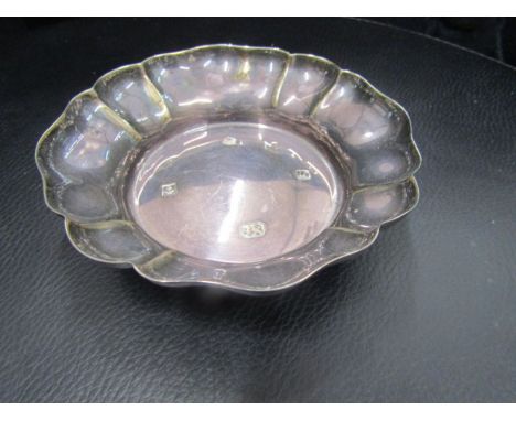 A silver hallmarked trinket dish Stradsett Hall 1995 inscription on base 70gms