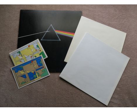 Pink Floyd Dark Side of the Moon 70's issue with posters and stickersin excellent condition throughoutdomestic and internatio