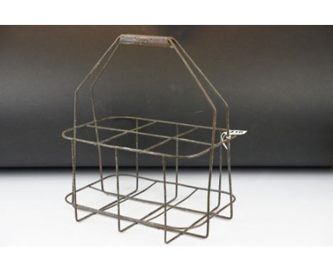 Vintage six-compartment milk bottle carrier, approx 31cm wide 