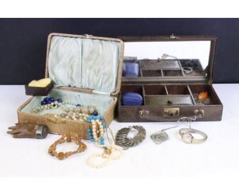 A collection of mainly vintage costume jewellery contained within two boxes to include silver and an otters foot brooch. 