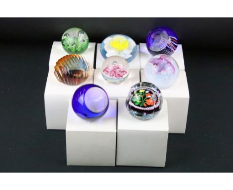 Eight Caithness paperweights to include; 25th anniversary of the first flight on concord, Sea Pearls Gold, Purity of Heart, G