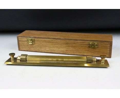 Cooke &amp; Troughton &amp; Simms Ltd rolling rule tool complete in footed wooden box. Box measures 33cm wide. 