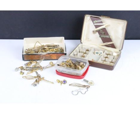 A collection of vintage tie clips and cufflinks to include Kremets examples. 