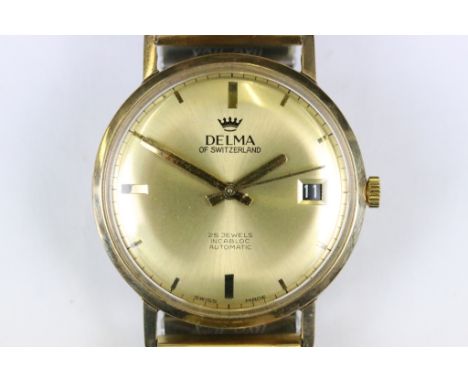 A vintage gents 9ct gold cased Delma 25 jewel wristwatch with date function to 3 o'clock. 