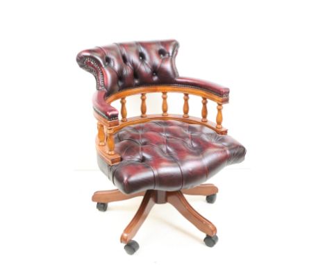Victorian style Swivel Office Elbow Chair with ox blood red leather button upholstery, 64cm wide x 72cm deep x 85cm high 