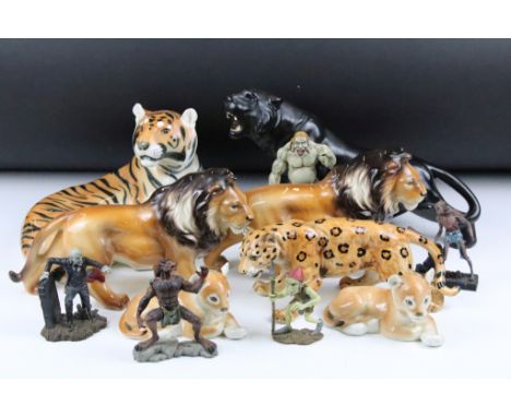 Collection of ceramic big cats to include four Lomonosov lions and two Lomonosov tigers. Also includes a Beswick lion cub, an