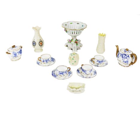 A Doulton blue and floral design Tea Set, with gilt highlights, comprising teapot, sugar bowl and four cups and saucers, a Ge