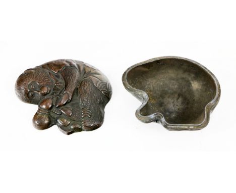 An attractive 20th Century Japanese heavy bronze two part Container, modelled as seated monkey with bowl and bottle in hand. 