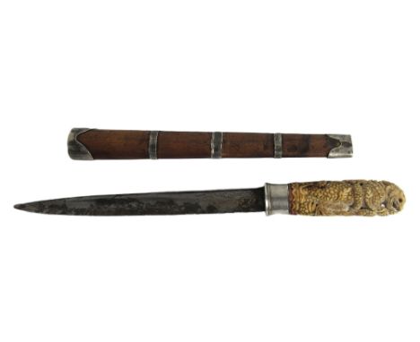 Militaria: A rare 19th Century Burmese Ceremonial&nbsp;Dagger, the hilt depicting a carved bone model of a standing dragon, t