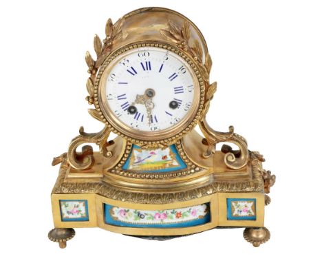 A small late 19th Century French ormolu and porcelain Boudoir Mantlepiece Clock, by Rollen, Paris, with circular convex ename