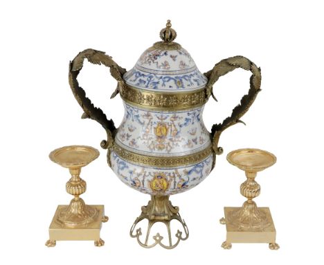 An Italian style brass mounted ceramic two handled Vase and Cover, and a pair of gilt metal Lamp or Candle Stands. (3)