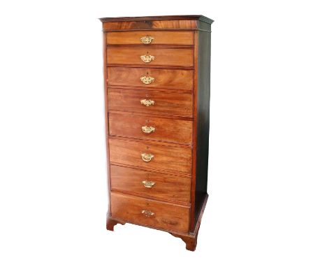 A George IV style mahogany tall Chest, with eight graduating drawers under a moulded cornice on bracket feet, 158cms h x 64cm