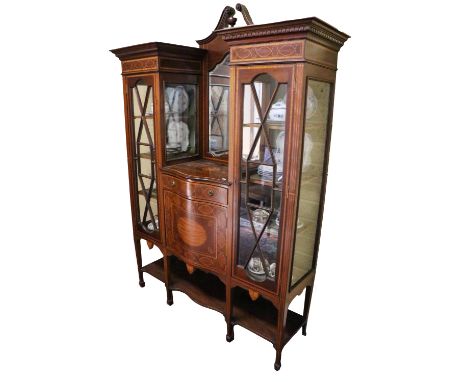 A 19th Century inverted breakfront Display Cabinet, the recessed mirror back central panel with swan neck pediment above sing